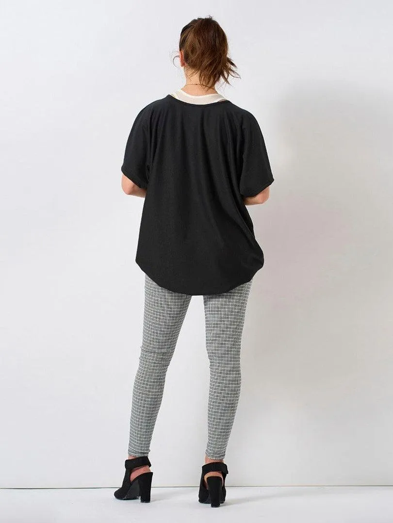 Pantalon à carreaux gris et fermeture éclair