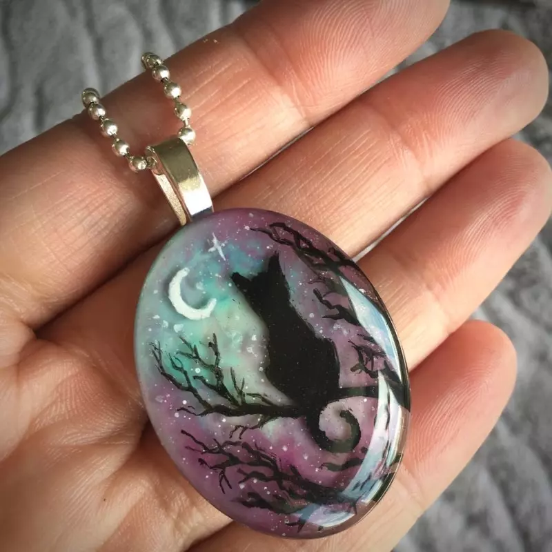 Pendentif chat en résine